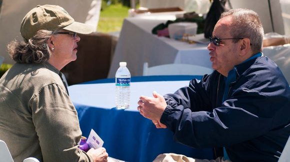 Dr. Jeffrey S. Harris of The Migraine Headache Relief Center of Pennsylvania speaks with a migraine sufferer.