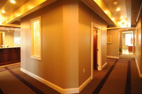 Looking down the hallways at MHRPA, at the end you can see one of our migraine headache treatment rooms.