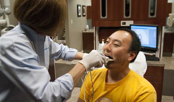 Andrew receives a dental force analysis diagnostic test to help us evaluate his headaches.